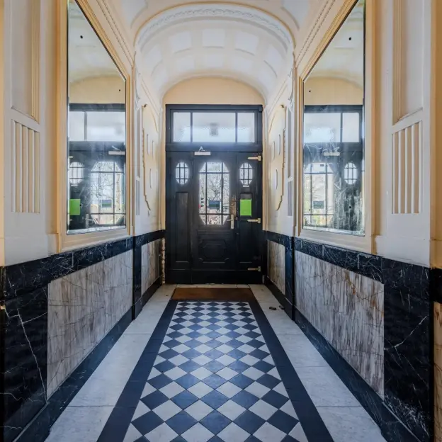 elegant-lobby-checkered-floor-berlin-apartment-building